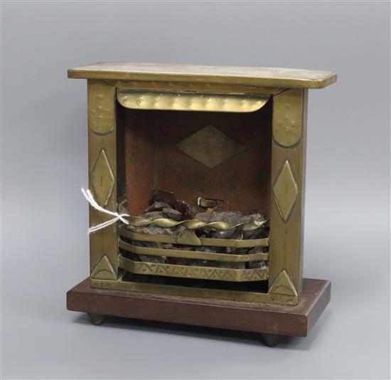 A World War I Trench art model of a fireplace with flint lighter